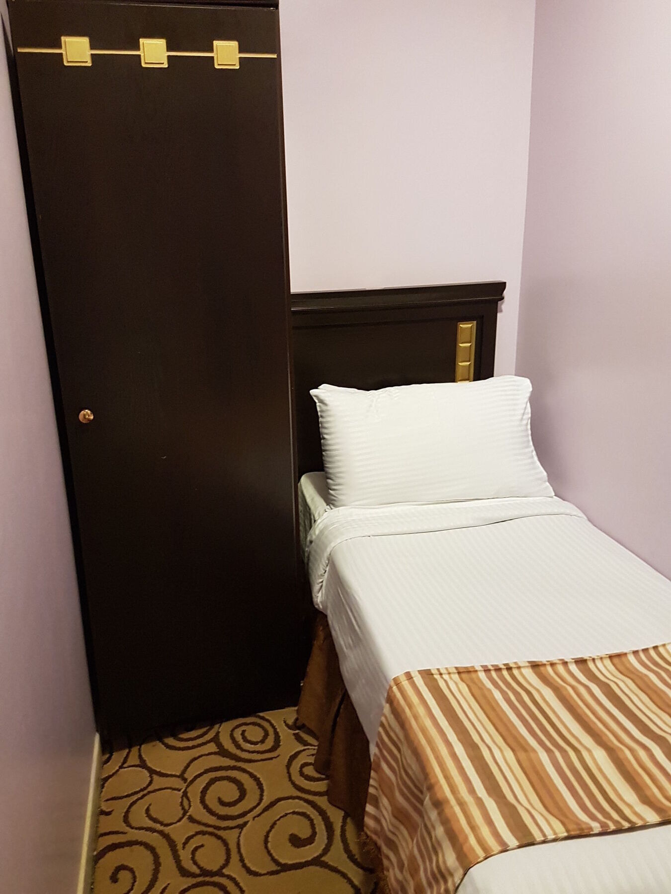 Taiba Suites Madinah Медина Экстерьер фото A single bed